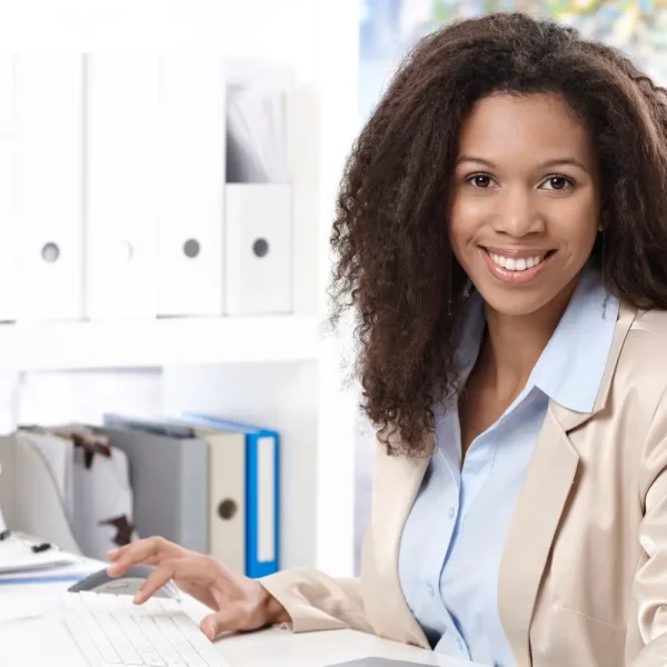 Office_Worker_In_Front_Of_Computer_Canva_1800x1000